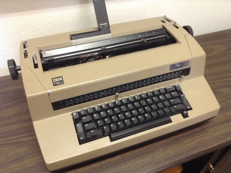 A vintage IBM typewriter on a desk